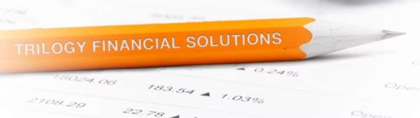 Orange Trilogy Financial Solutions pencil on financial documents